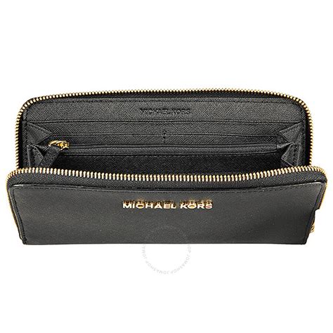 michael kors jet set zip around continental wallet black|michael kors travel continental wallet.